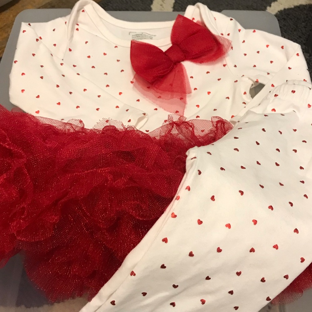 Red and white tutu dress with leggings.